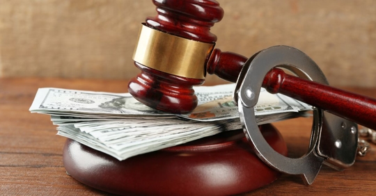 money under judges gavel