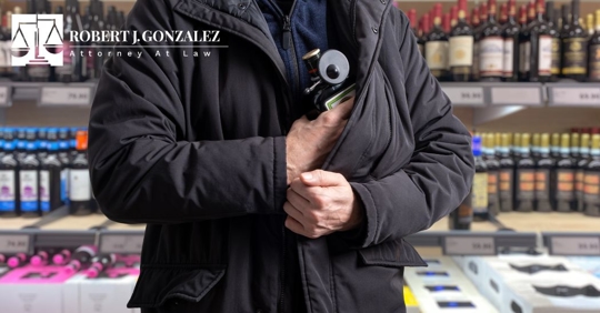 shoplifter stealing liquor